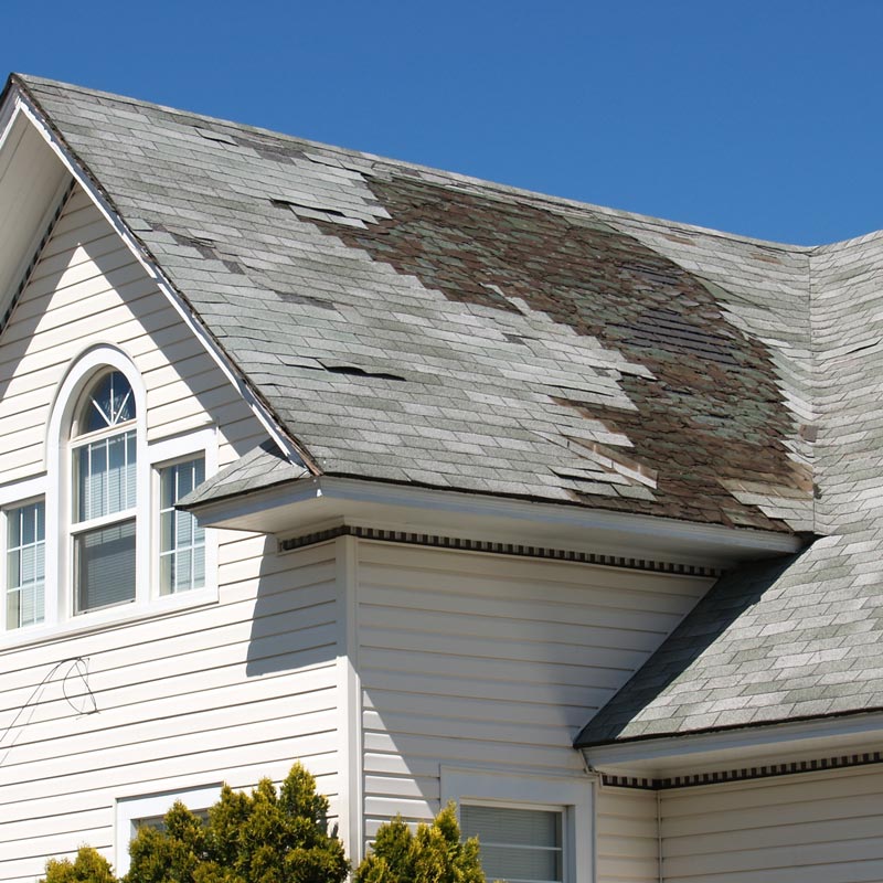 asphalt roof missing shingles after storm damage